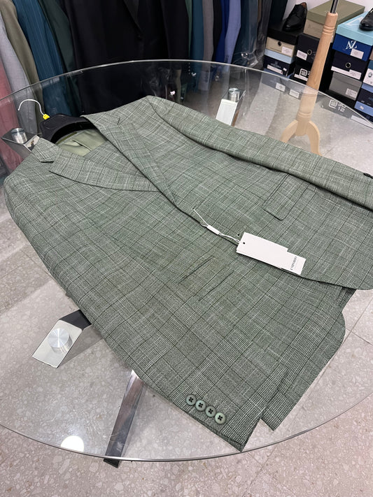 Abito da uomo verde con motivo a quadri