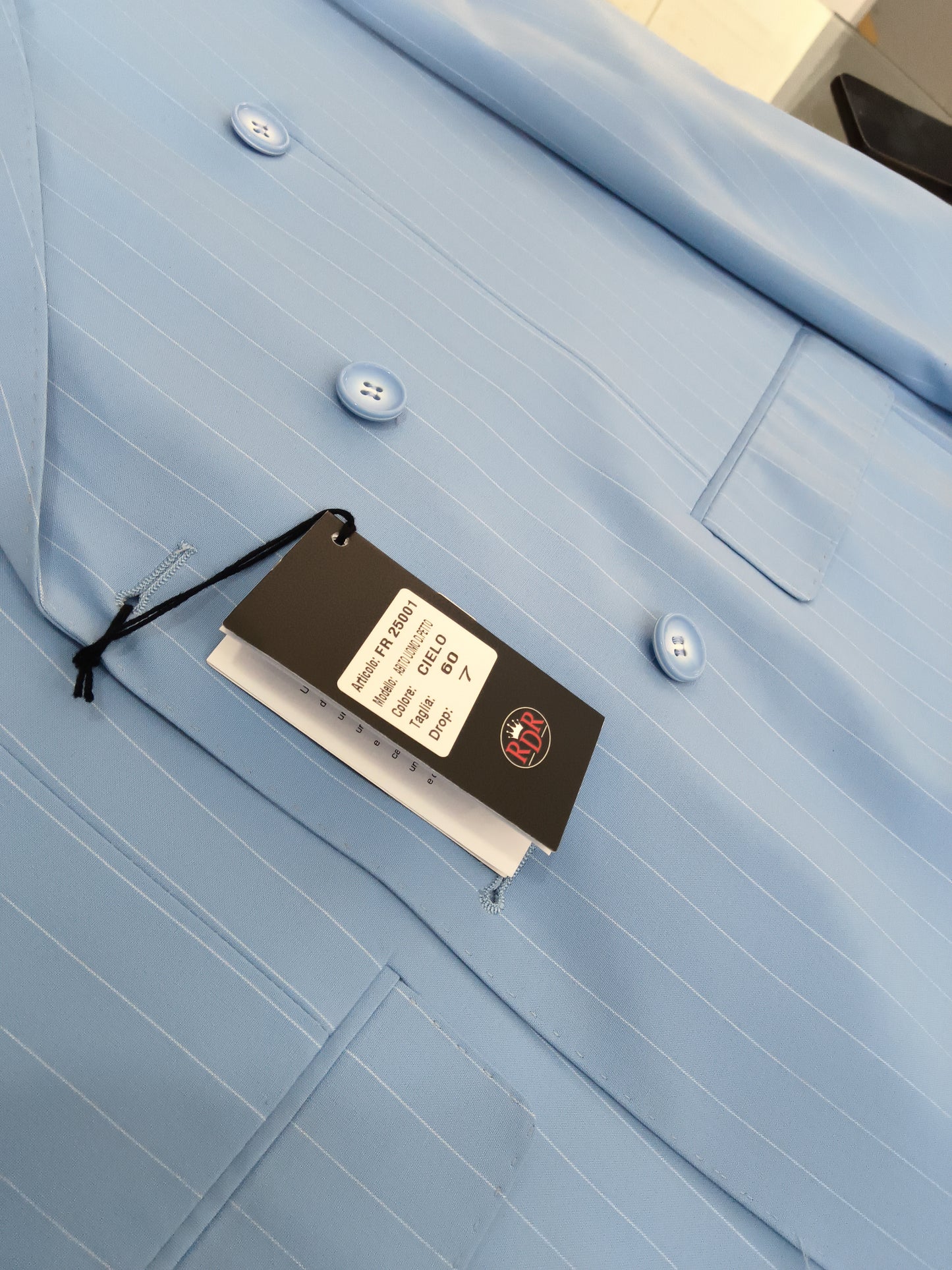 Doppio petto calibrato azzurro gessato e beige
